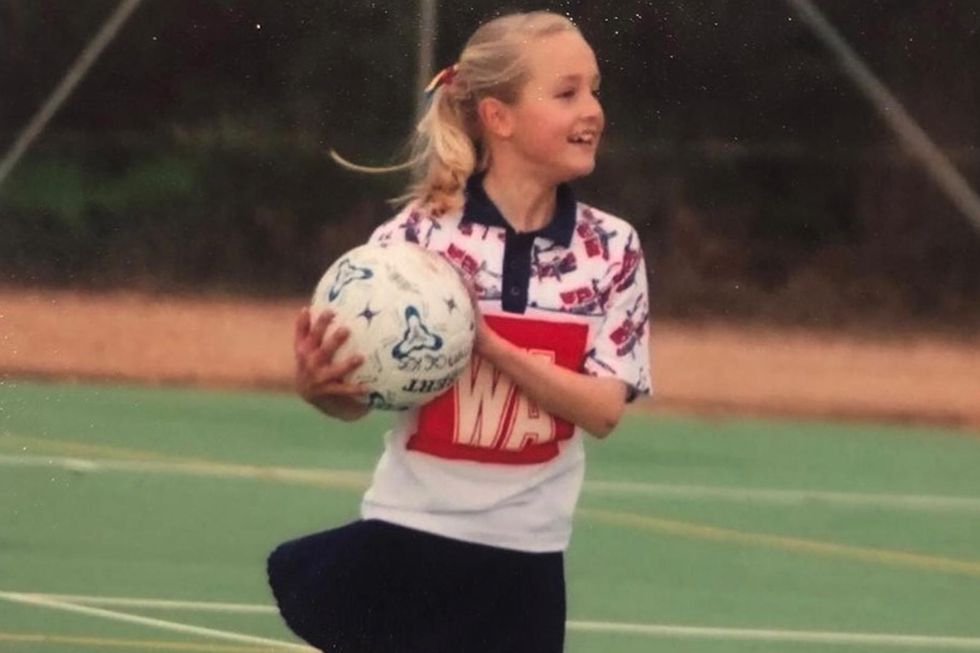 A 10-year-old Tayla Williams playing netball.