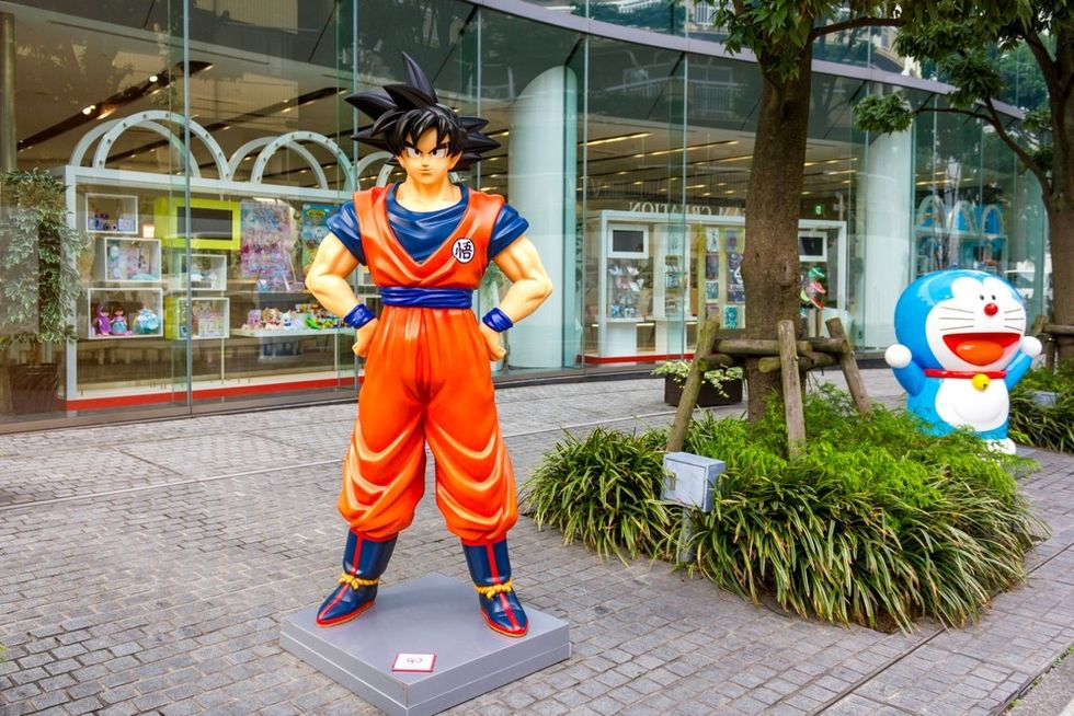 A brightly coloured statute of an anime character