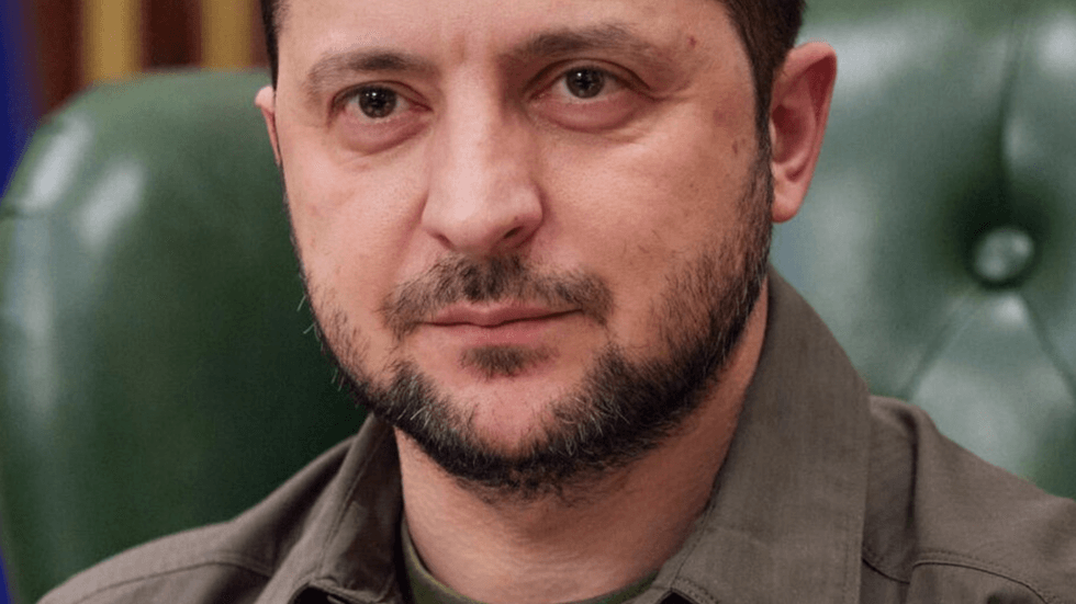 A close up of a man with a dark beard