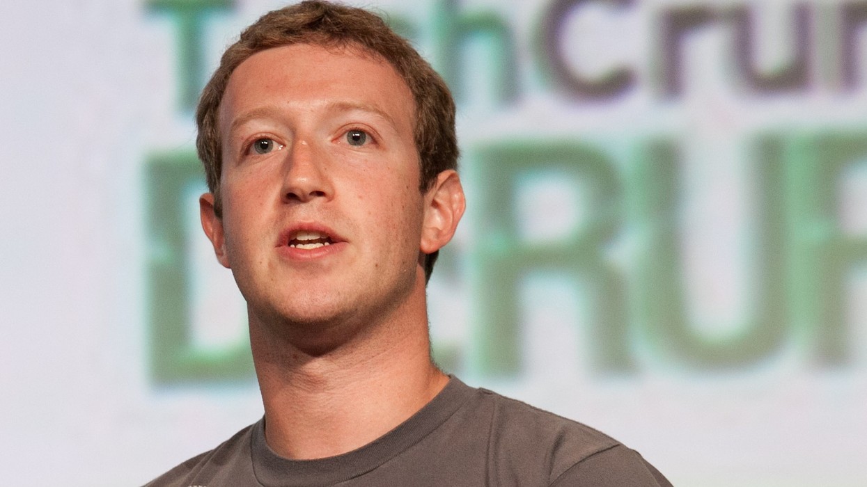 A close up of a man with short brown hair