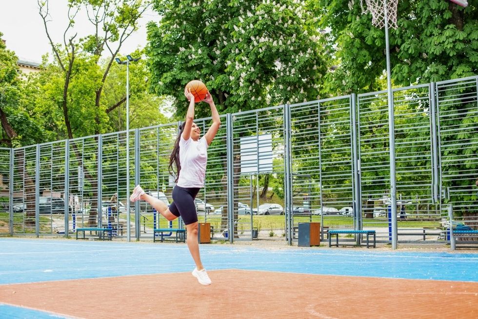 A female netball player on the court