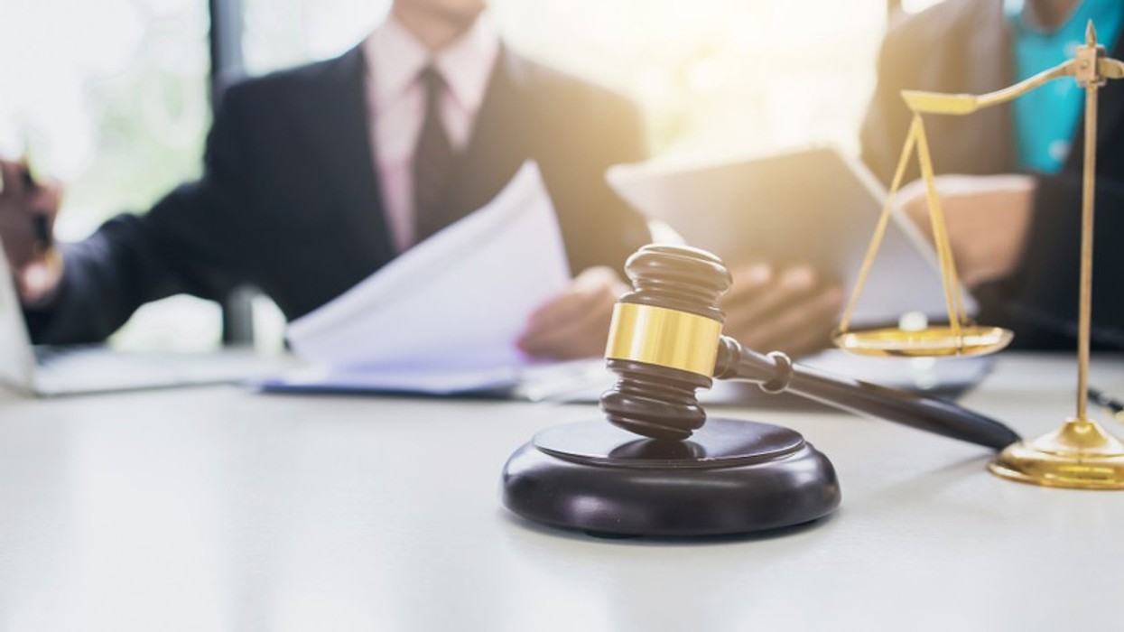 A gavel and legal scale