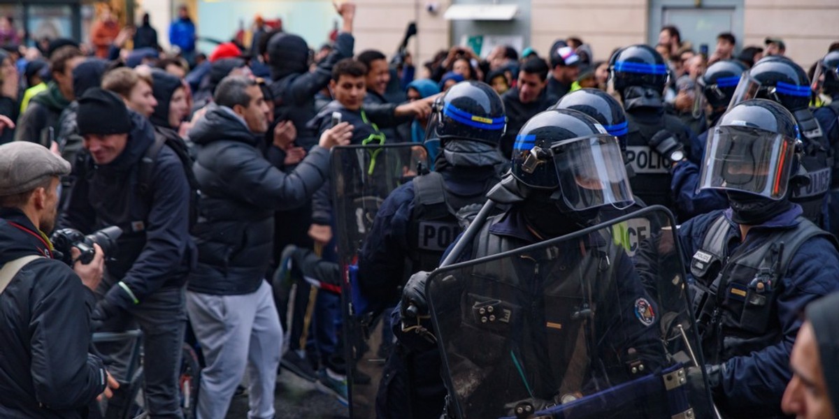 A group of people and police