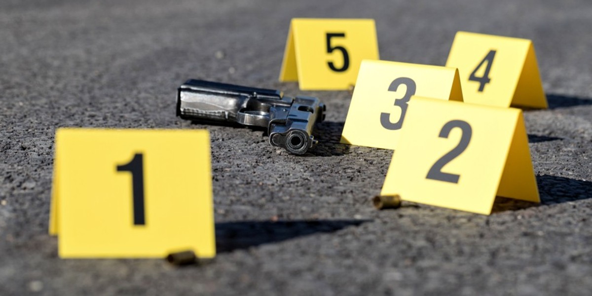 A gun and some number cards