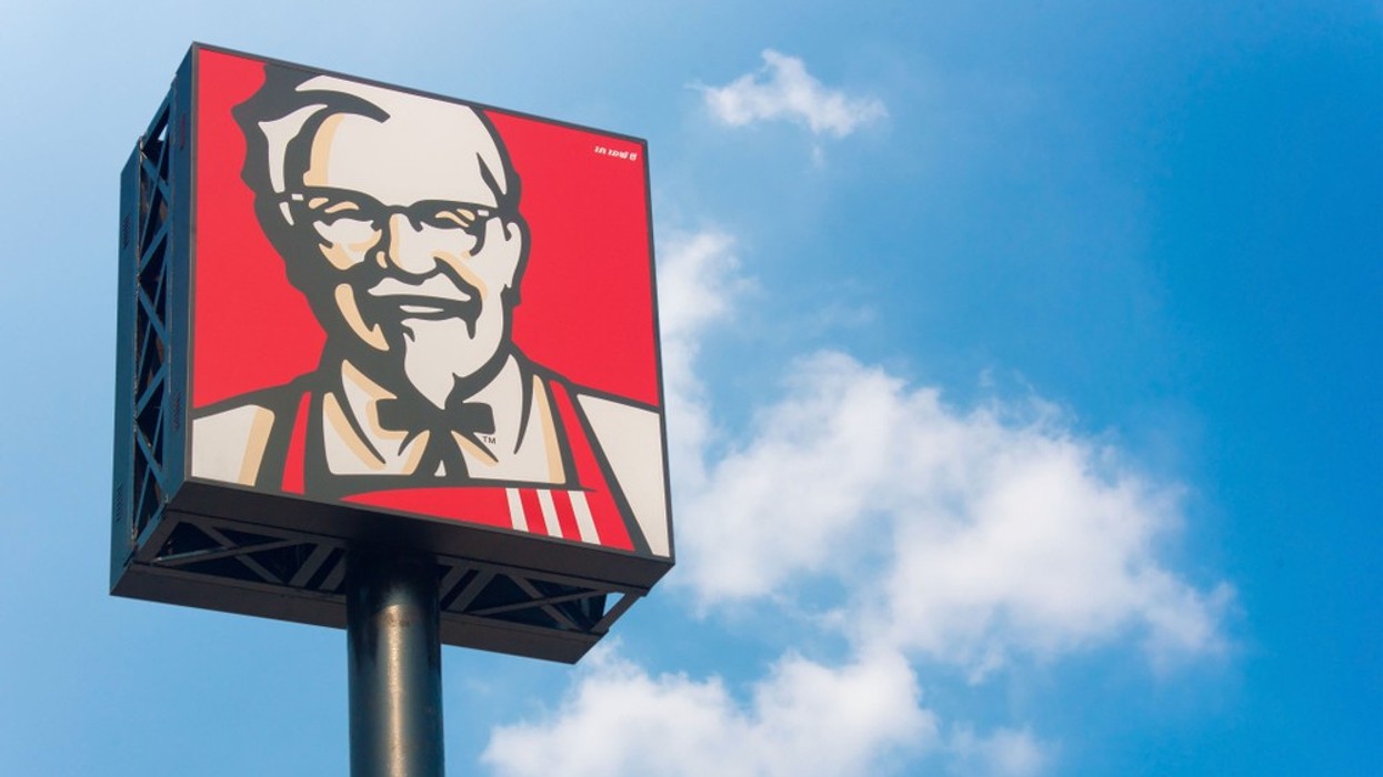 A KFC sign showing the Colonel