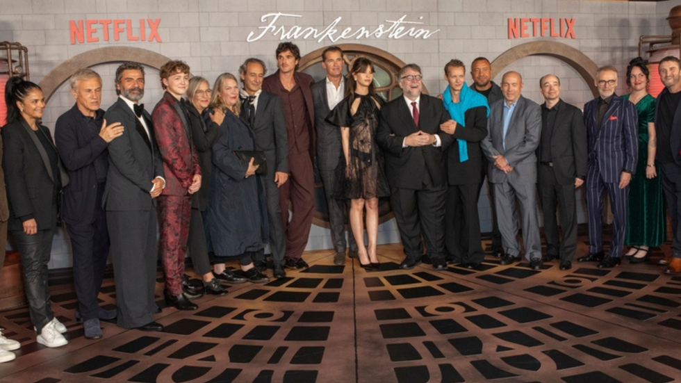 A large group of people posing for a camera