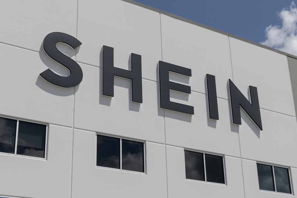 A large white building with the name Shein on it