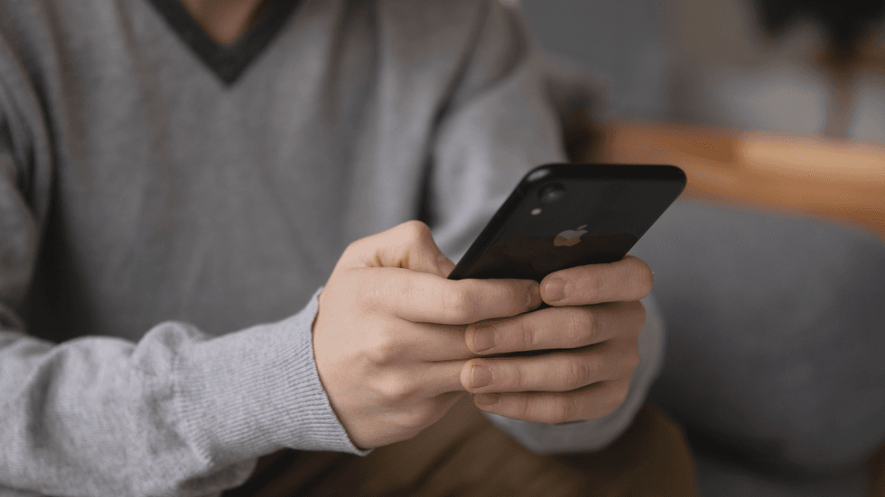 A man holding a phone
