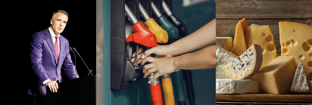 A man in a dark blue suit, a petrol bowser and a selection of cheeses.