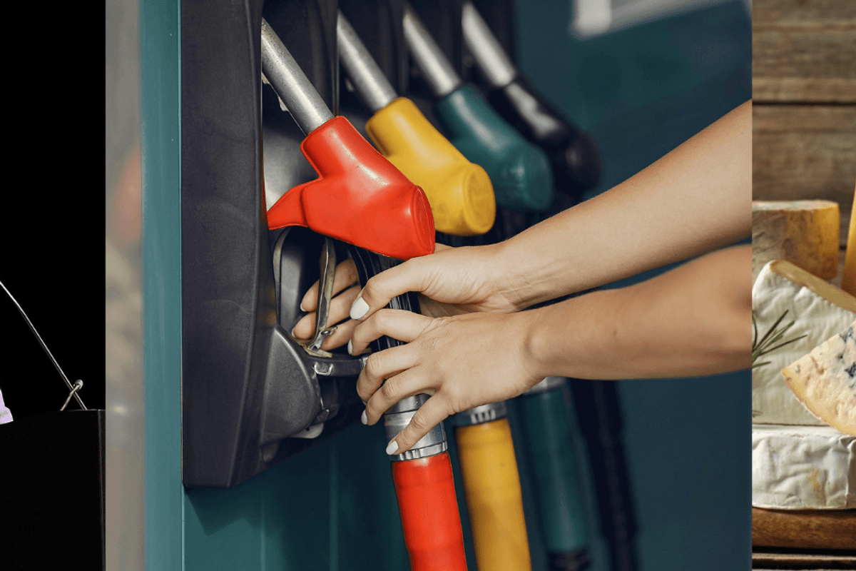 A man in a dark blue suit, a petrol bowser and a selection of cheeses.