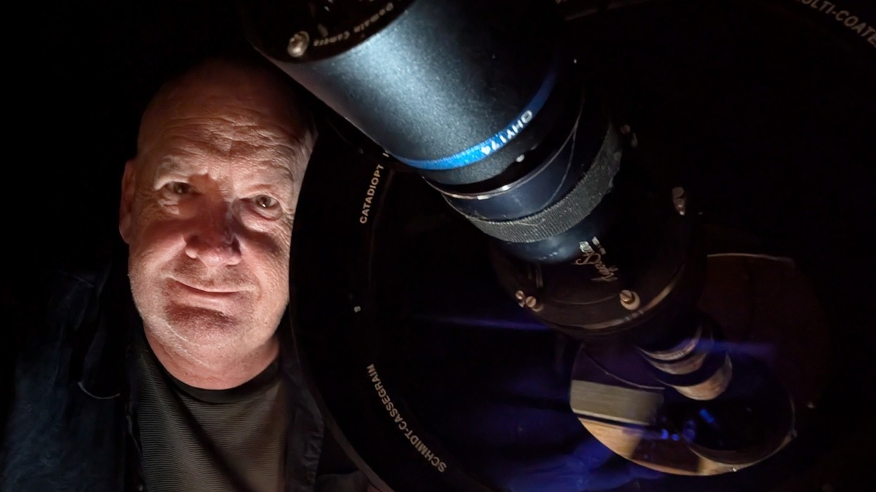 A man with a telescope