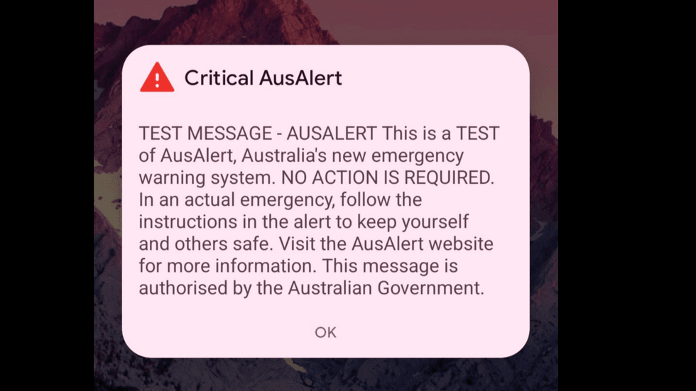A screenshot of a mobile phone with an Aus alert message