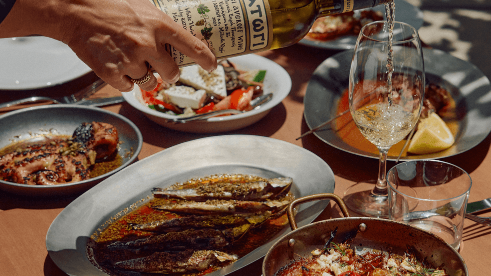 A selection of plates including fish and salad
