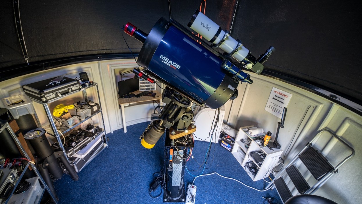 A telescope in a home set up