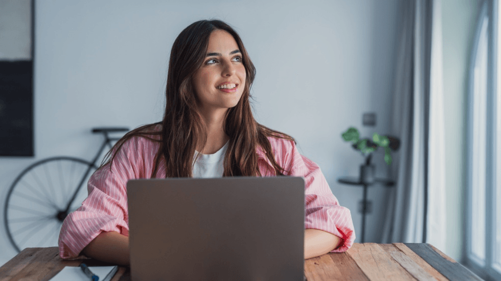 A young woman with a laptop