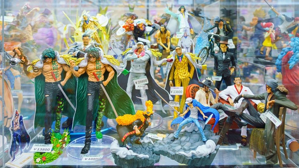 Colourful anime figurines in a shop window