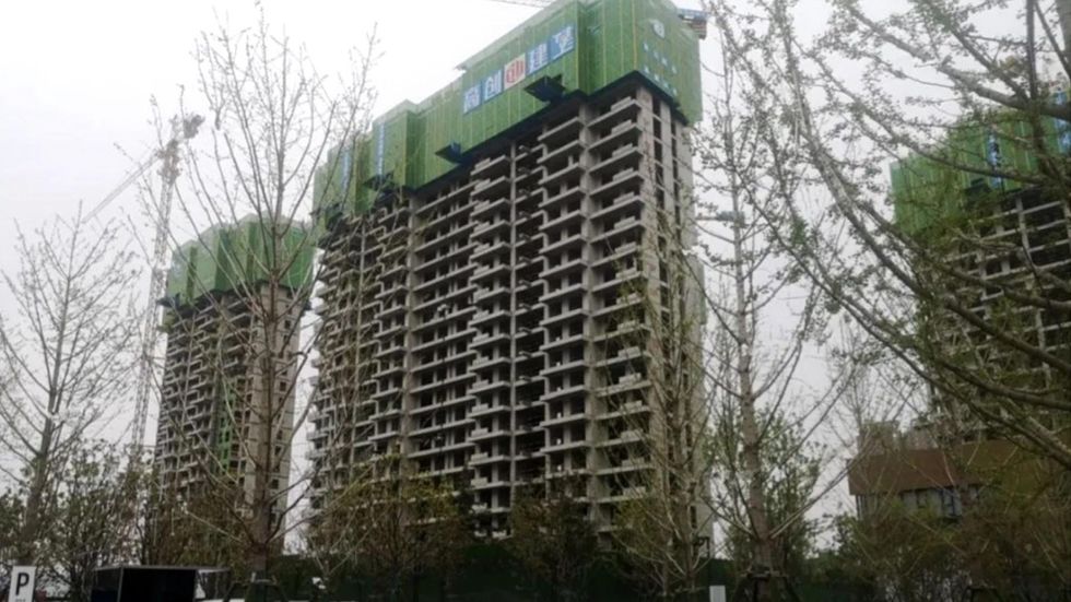 Image of of Wang's unfinished apartment building in Zhengzhou, China.