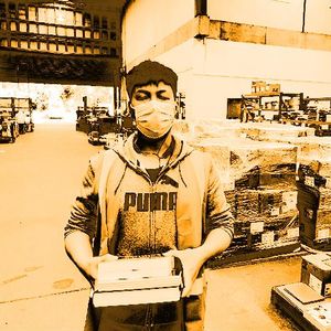 Wide image of orange sunset with an inset of a Sydney warehouse worker.  Inset photo by Steven Willems.