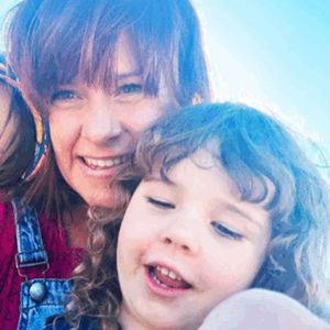 Two images side by side of mother and her two toddler daughters hugging and image of mother and pre-teen sons sitting on a stockyard rail in jeans and stockman hats.
