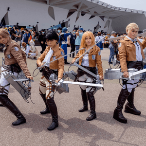 A triptych of people cos-playing as anime characters
