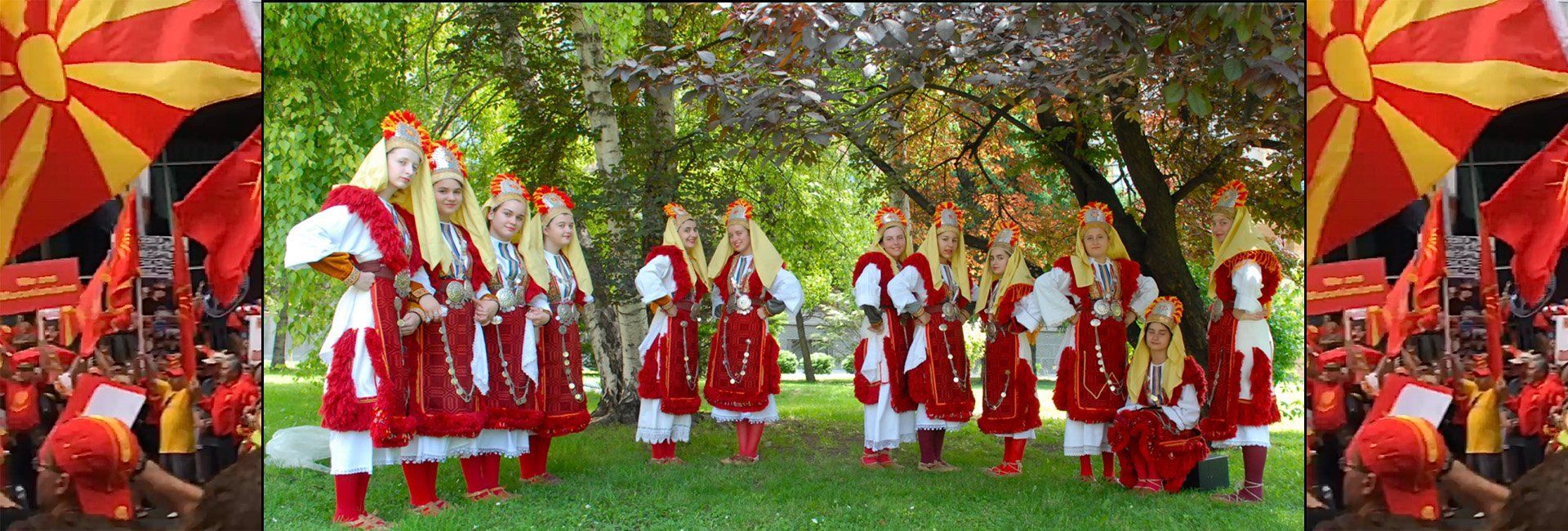 Line of young girls in traditional Macedonian cultural dress.