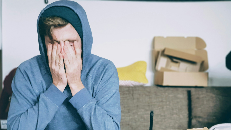 man sitting on a couch
