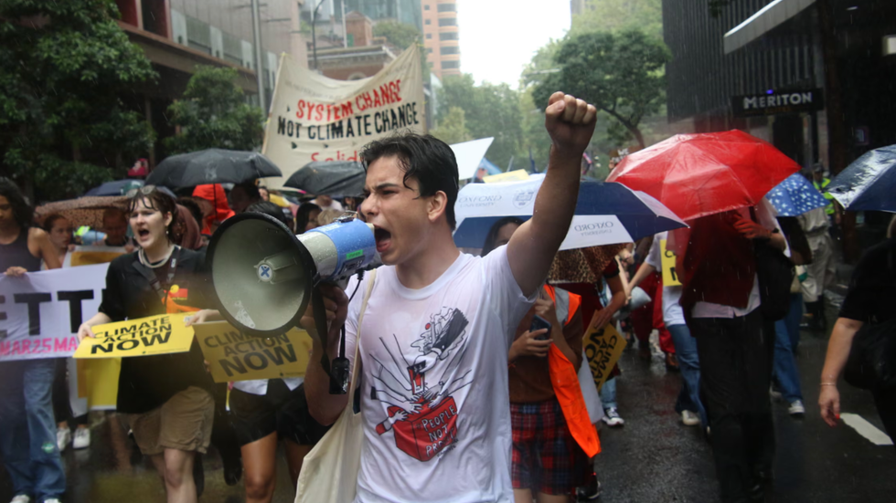 Owen leading the climate protest in Sydney