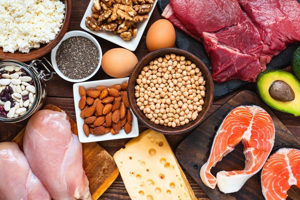 Spread of protein rich food including chicken, fish, nuts and seeds