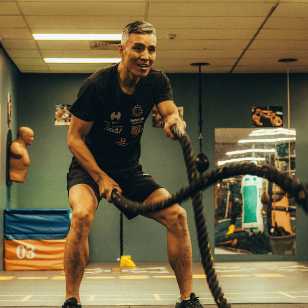Three pictures of an older man training in a boxing gym