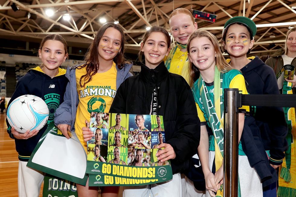 Young female netball fans